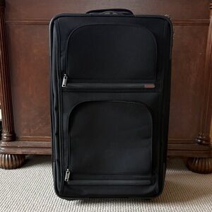 Tumi Black Travel Suitcase